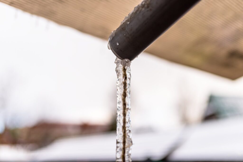 rsz frozen water flowing from the roof through a plast 2023 11 27 05 31 19 utc